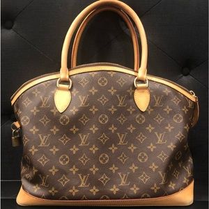 Louis Vuitton Alma Monogram Voyage Bag.  Great For mini getaway.